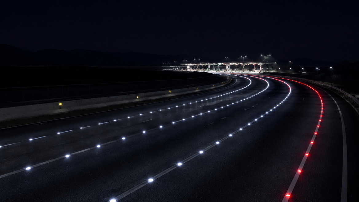 Led Road Studs On Highway Curve At Night Led Road Studs On Highway Curve At Night