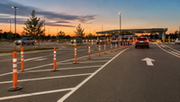 //inrorwxhlmlnlj5p.ldycdn.com/cloud/pnBpnKnklrSRmlninnijkq/Traffic-Delineators-In-Modern-Parking-Lot.jpg